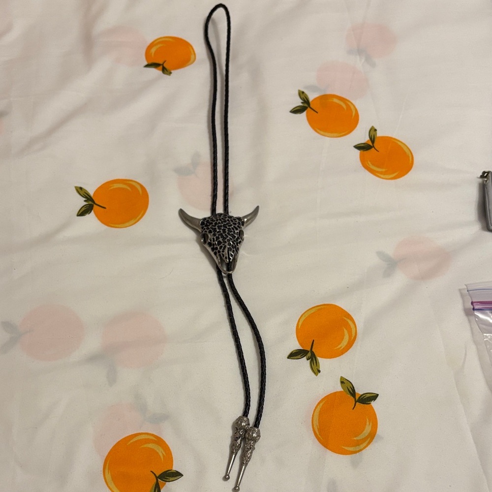 Silver Buffalo Head Bolo Tie 18β length.
